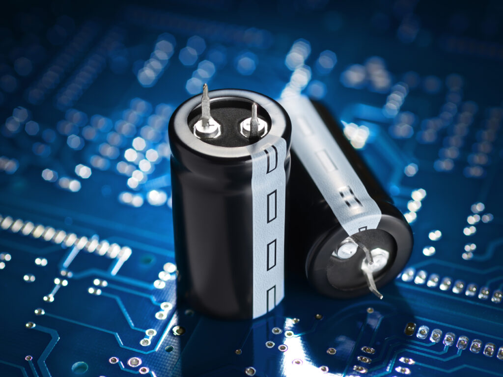 Close-up of industrial-grade electronic components on a circuit board, representing the internal build quality and reliability of Great Will's telematics hardware.