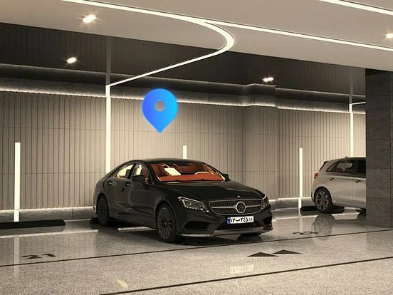 A black car in an underground garage being located by the Galagps platform's assisted positioning feature.