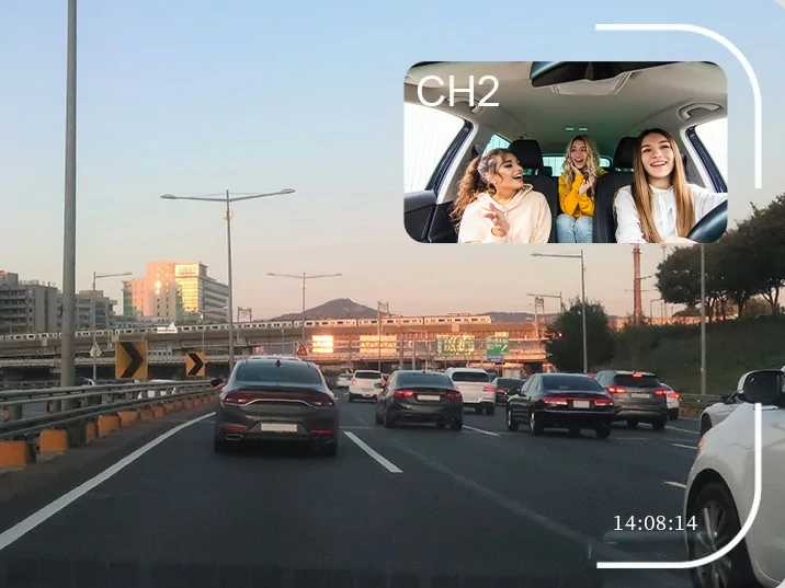 The GD11 dashcam's dual-channel recording, showing a picture-in-picture view of the road ahead and the car's interior.