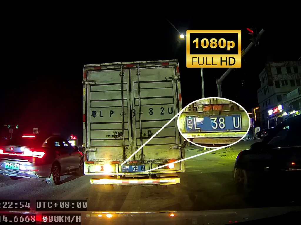 A clear 1080p Full HD night vision image from the GDW3 dashcam, successfully capturing a truck's license plate.